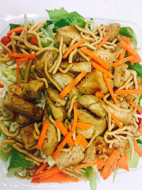 Shanghai Chicken Salad · Romaine lettuce, grilled chicken breast, Napa cabbage, green onions, carrots, tomatoes, chow mein noodles and Mandarin orange dressing.