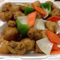 Sweet and Sour Pork · Breaded Deep Fried Pork Sirloin with Sauce on the side. Green Bell Pepper,Carrots,White onions