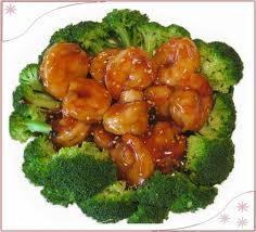 Sesame Shrimp · Large shrimps lightly battered and deep fried until crispy brown and topped with our chef's special sesame based sauce and fresh broccoli. Served with steamed or fried rice.