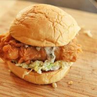 Fried Haddock Sandwich · Fresh haddock filet deep fried and topped with coleslaw on a Portuguese sweet roll served wi...