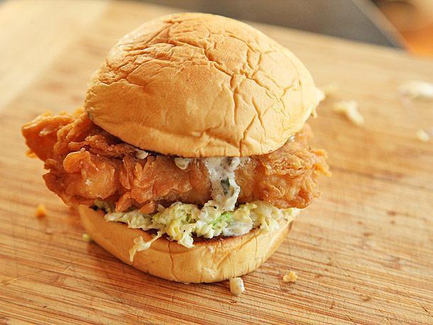 Fried Haddock Sandwich · Fresh haddock filet deep fried and topped with coleslaw on a Portuguese sweet roll served with homemade tartar sauce.
