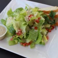 Caesar Salad · Romaine lettuce, cherry tomatoes, and Parmesan cheese.