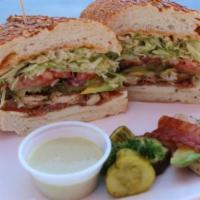 13. Chicken Club Sandwich · Avocado and bacon. Cajun mayo, Yellow mustard, lettuce, tomato, red onion and pickles.