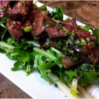 Thai Steak Salad · Grilled Tri Tip, mixed Greens, tomatoes, sweet red onions, carrots and Thai dressing.