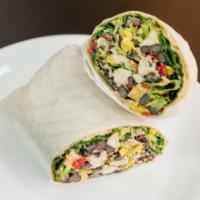 Southwest Chicken Wrap · Grilled chicken, corn, black beans, cheddar cheese, greens, Southwest dressing and tortilla ...