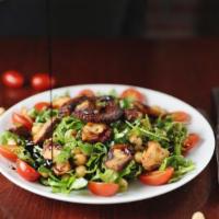 Grilled Octopus · Arugula, cherry tomatoes, chickpeas, extra virgin olive oil and balsamic reduction. Gluten f...