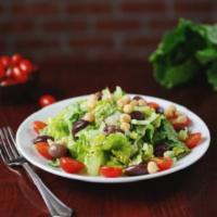 House Salad · Urban favorite. Romaine, cherry tomatoes, chickpeas, celery, Kalamata olives and house dress...