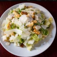 Classic Caesar Salad · Romaine, Parmigiano-Reggiano, croutons and Caesar dressing.