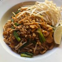 D81. Pad Thai · Stir-fried thin rice noodles with eggs, red onions, green onions, bean sprouts and crushed p...