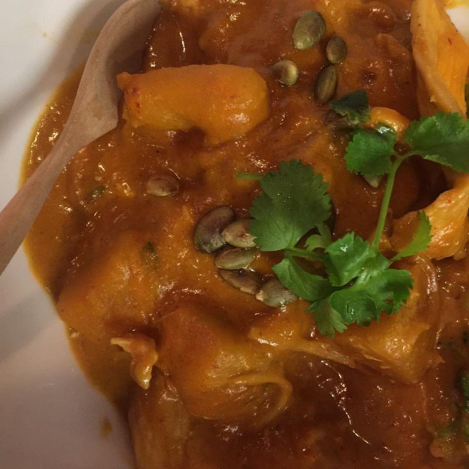 D56. Burmese Pumpkin Curry · Choice of meats or tofu cooked with ginger coconut milk, kabocha squash topped with pumpkin seeds and cilantro. Choice of seafood for an additional charge.