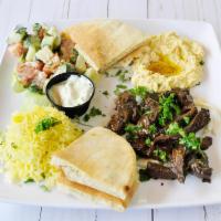 Beef Shawarma Lunch · Thin slices of seasoned beef. Served in a pita pocket with lettuce, tomato, parsley and tahi...