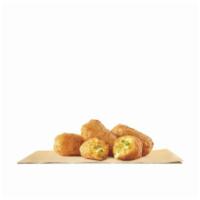 4pc Jalapeno Cheddar Bites · Our Jalapeño Cheddar Bites are filled with gooey cheddar cheese and spicy jalapeño pieces, c...
