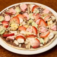 Sweet Pizza · Nutella, marshmallow, banana, strawberries and almonds.