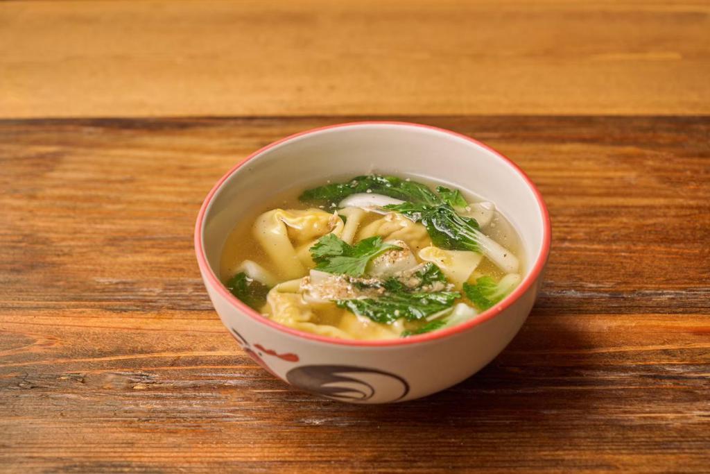 Geoy Nam · Chicken broth soup with minced chicken wrapped in wonton skin and bok choy.