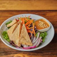 Salad Keak · Mixed greens, carrot, cucumber, red onion, tomato and fried tofu. Served with peanut dressing.