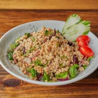 Labb Gai · Cooked ground chicken, seasoned with red onion, scallion, mint leaves, grounded roasted rice...