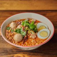 🌶 Gauy Tiew Tom Yum  · Tom yum noodle soup with rice noodles, ground pork, cilantro, egg, peanut, pork ball and bea...