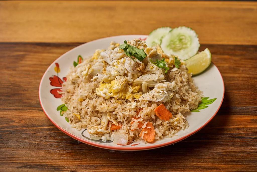 Khao Phad Nuea Poo · Fried rice with jumbo white crabmeat, egg, cilantro, onion and carrot.