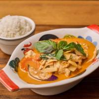 Gaeng Dang 🌶 · Thai style red curry with bamboo shoot, basil leaves, carrot, eggplant and bell pepper simme...