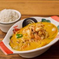 Gaeng Karee · Yellow curry paste with tomato, potato, bell pepper and onion simmered in coconut milk. 