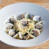 Linguine Alle Vongole · Fresh clams sauteed in white wine, garlic, and onion, and tossed with linguine.  