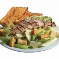Chicken Caesar Salad · Romaine lettuce, Parmesan cheese, gourmet croutons, grilled chicken and creamy Caesar dressi...