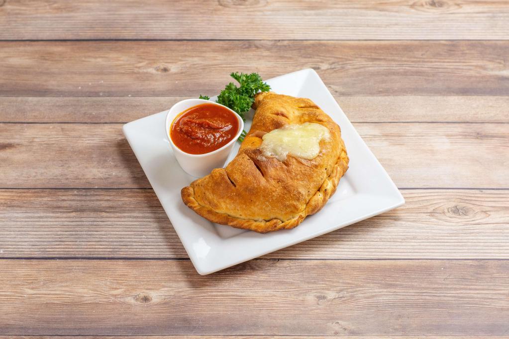 Amato Calzone · Pepperoni, mushrooms, yellow onions and black olives folded with homemade tomato sauce. Add toppings for an additional charge.
