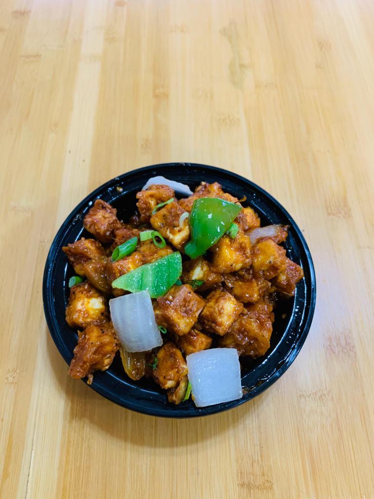 Chili Paneer · Fried cottage cheese stir fried with sweet peppers, green chilies, onions and special herbs.