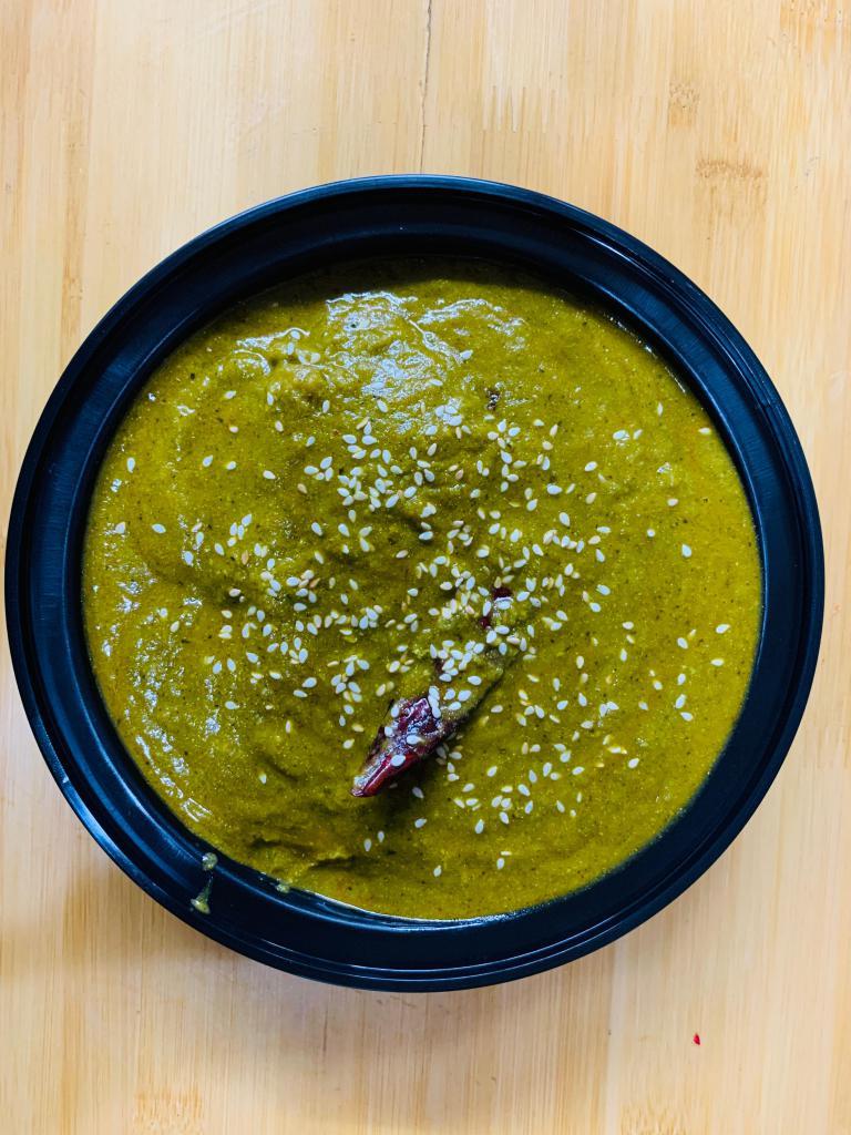Gongura Goat · 1 of the best traditional goat dishes cooked with fresh gongura sauce, tadka with mustard and red chilies.