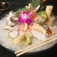 Sashimi Deluxe · 15 pieces of assorted sashimi. Served with soup or salad, and steamed rice.