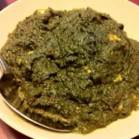 Palak Paneer · Paneer (fresh cheese) cooked in spinach and spices. Vegetarian.