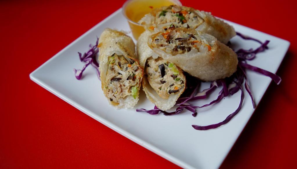 Crispy Roll Plate · 2 piece ground chicken, black mushroom, bean thread noodle, carrot, bean sprout, green onion and crispy rice paper with sweet chili sauce. Gluten free.