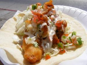 Fish Taco · Beer battered served on corn tortilla with lettuce, cabbage, salsa fresca, homemade white sauce.