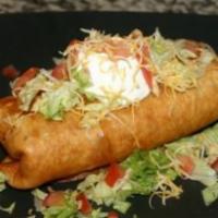No 9. Chimichanga Combo · Beef or chicken burrito chimichanga style rice and beans on the side.