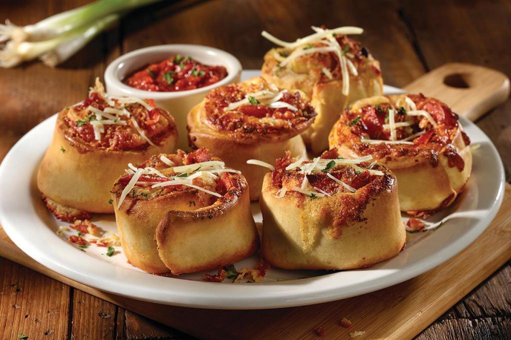 SICILIAN PEPPERONI ROLLS™ · Signature dough, pepperoni, fresh green onions & cheese.  Served with signature red sauce.