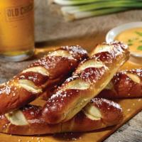 BAVARIAN PRETZEL STICKS · Four Bavarian pretzel sticks, mustard cheese sauce made with Guinness.