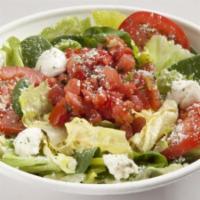 Caprese Side Salad · Caprese side salad, made with mixed greens, baby spinach, fresh Roma tomatoes, fresh mozzare...