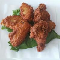 6 pieces Chicken Wings · Deep-fried wings.