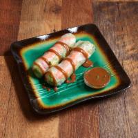 A4. Shrimp Spring Rolls · 2 pieces. Rice vermicelli, lettuce, cilantro and mint rolled in rice paper and served with p...