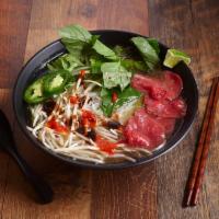 P15. Combination Pho (Pho Dac Biet) · Pho with combination of lean rare steak, well-done brisket, flank, tendon, tripe and beef me...