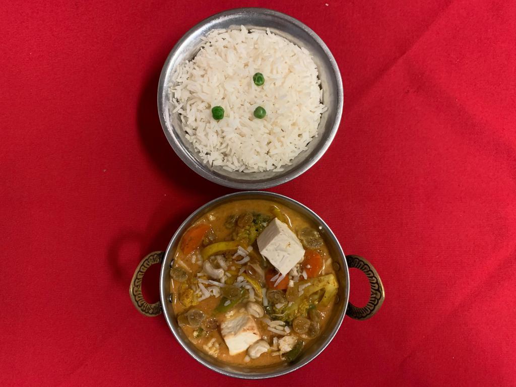 Nawaratan Korma · Vegetable coconut curry. Mixed vegetables cooked with coconut and himalayan sauce and spices. Served with basmati rice. Vegetarian.