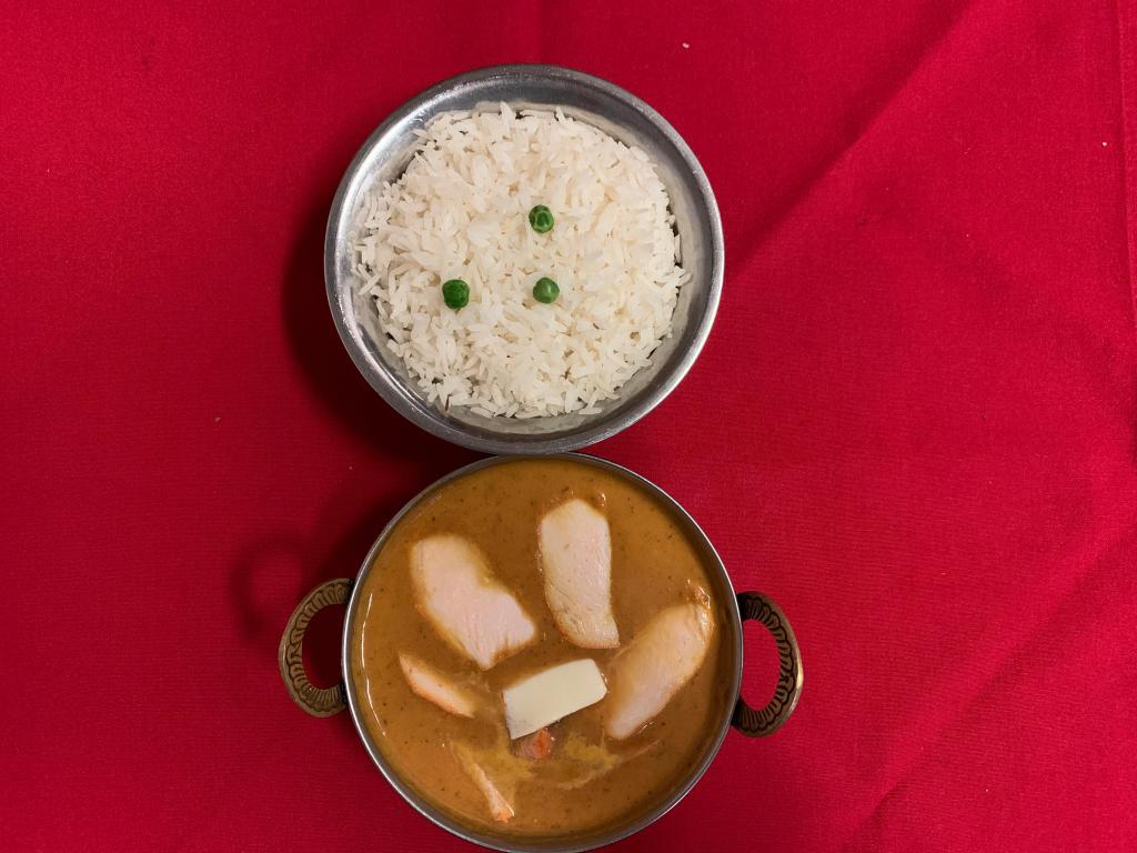 Chicken Makhani (Butter chicken) · Premium chicken cooked in the tandoor and then baked in a butter sauce. Served with basmati rice.