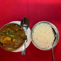 Himalayan Balti · Assorted pieces of tandoor baked chicken breast, lamb, shrimp, mixed vegetables cooked with ...