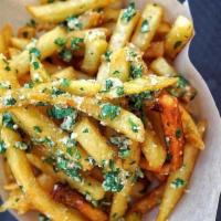 Truffle Parmesan French Fries · tossed with truffle oil and fresh grated Parmigiano Reggiano cheese