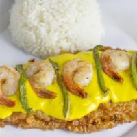 Picante with Shrimp · Sauteed shrimp with a smooth sauce of imported chilies from Peru, fish filet, served with st...