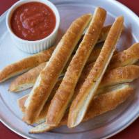 Breadstyxz · With homemade red sauce or ranch. Vegetarian.