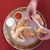 Pepperoni Roll · Pepperoni and smoked provolone cheese expertly rolled in our hand-tossed original crust. Inc...