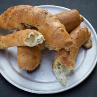 Chee-Z Rolls · Smoked provolone, mozzarella, Parmesan and Romano cheeses. Rolled-up in hand-tossed original...