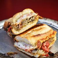 Meatball Sandwich · Sliced meatballs and homemade red sauce with smoked provolone, Parmesan, and Romano cheese. ...