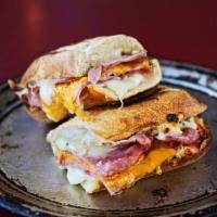Ham and Cheese Sandwich Combo · Smoked ham layered with white American and cheddar cheese. Served up toasty on a Tuscan bagu...